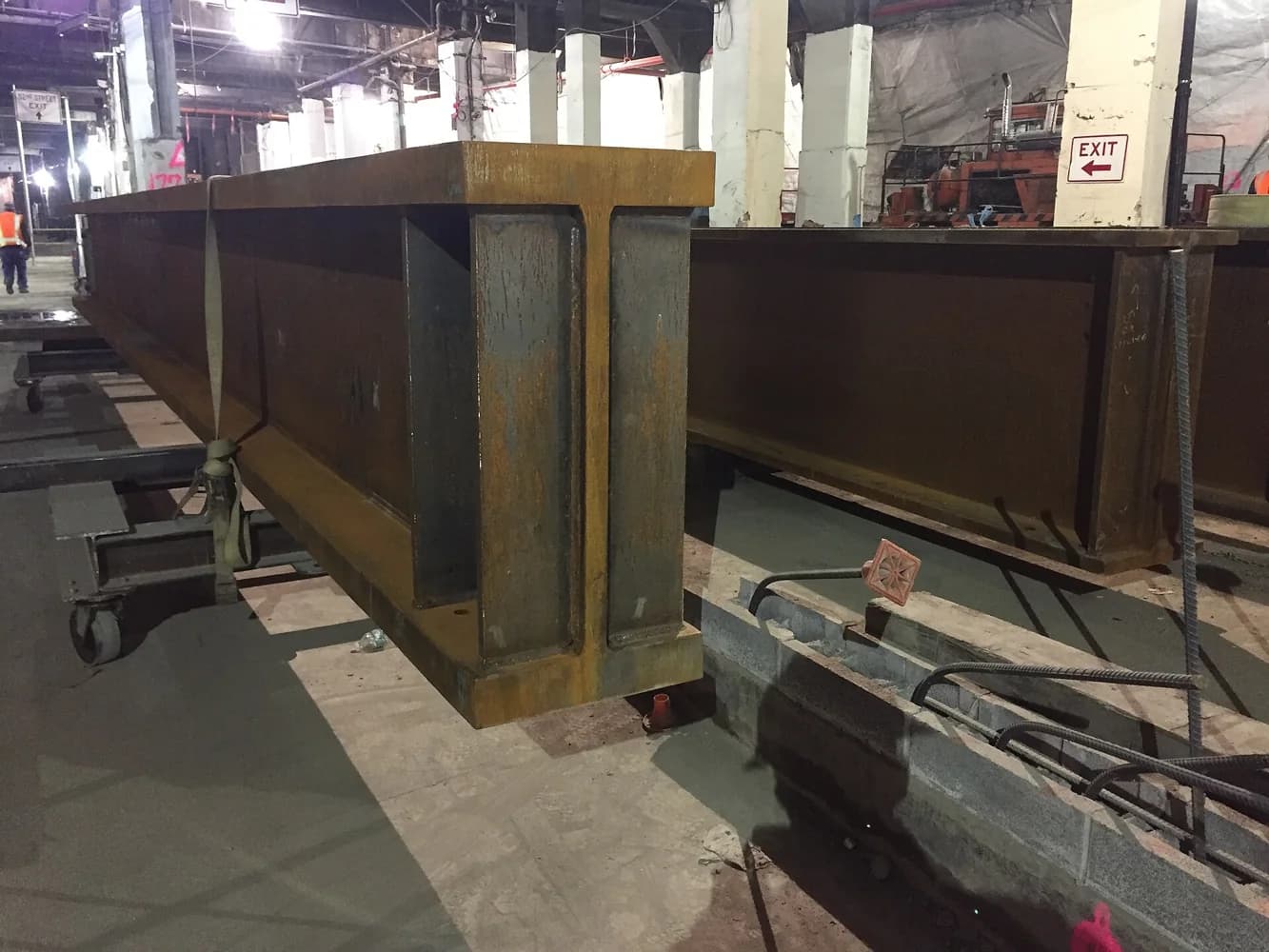 Fabricated steel beams prepared for a construction installation