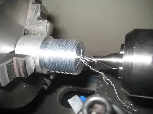 Boring a threaded aluminum component on a metal lathe