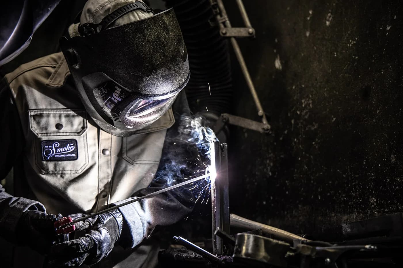 Welder joining steel with an electric arc